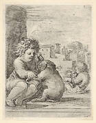 Child teaching a dog to sit, the child seated to left against a wall, teaching the dog to sit on its hind legs, another child embracing a dog to right in the background